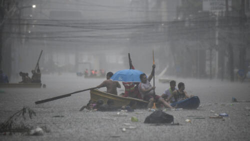 Streets turned into rivers as Typhoon Gaemi blows past Philippines